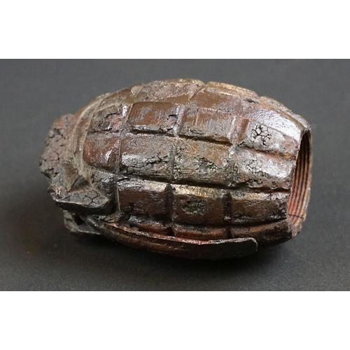 198 - A deactivated relic condition mills bomb hand grenade together with a selection of inert ammunition.