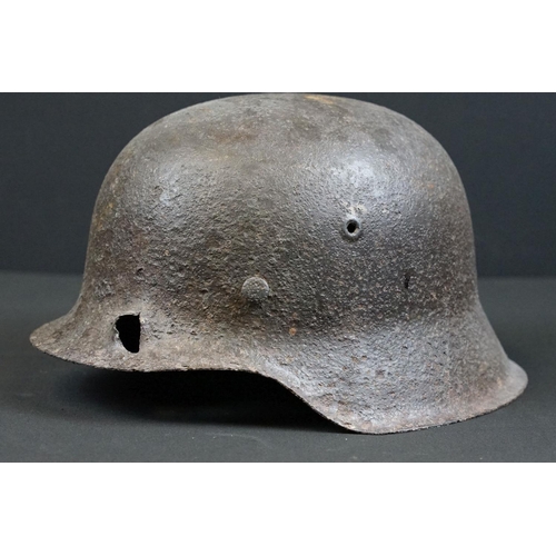 200 - A World War One German stahlhelm steel helmet in relic condition.