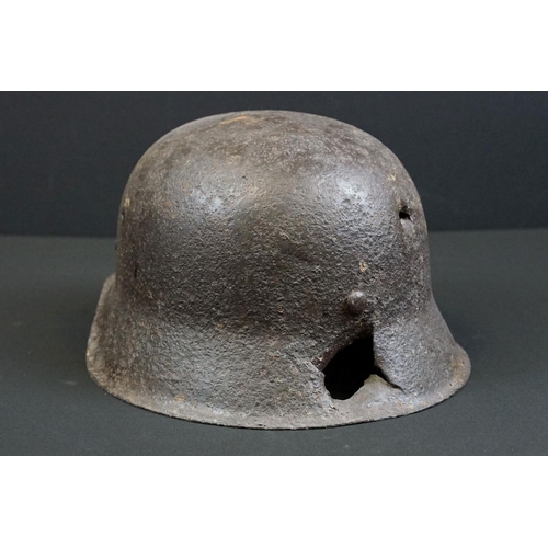 200 - A World War One German stahlhelm steel helmet in relic condition.