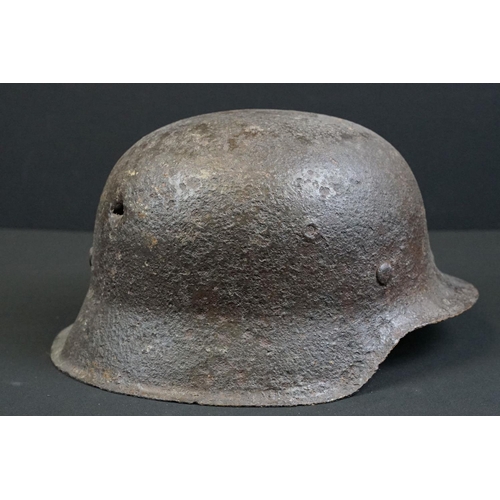 200 - A World War One German stahlhelm steel helmet in relic condition.