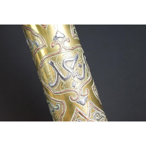 203 - A trench art vase with ornate decorative design made from a spent artillery shell.