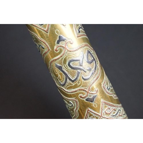 203 - A trench art vase with ornate decorative design made from a spent artillery shell.