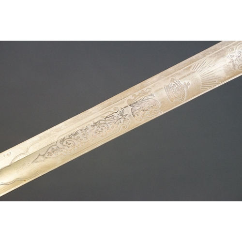 214 - A British Victorian Infantry officers sword, VRI cypher to the brass guard, complete with scabbard.