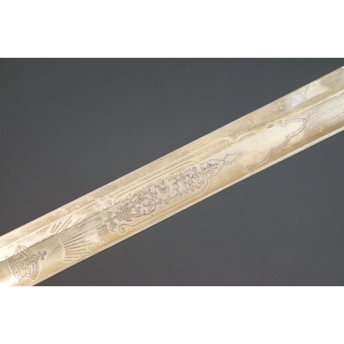 214 - A British Victorian Infantry officers sword, VRI cypher to the brass guard, complete with scabbard.