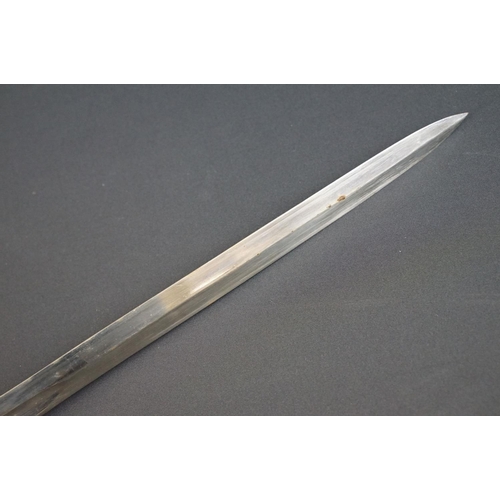 214 - A British Victorian Infantry officers sword, VRI cypher to the brass guard, complete with scabbard.