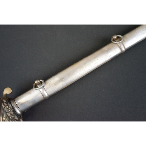214 - A British Victorian Infantry officers sword, VRI cypher to the brass guard, complete with scabbard.