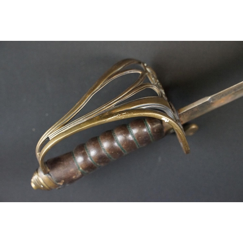 214 - A British Victorian Infantry officers sword, VRI cypher to the brass guard, complete with scabbard.