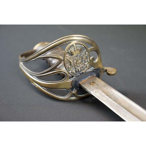 214 - A British Victorian Infantry officers sword, VRI cypher to the brass guard, complete with scabbard.