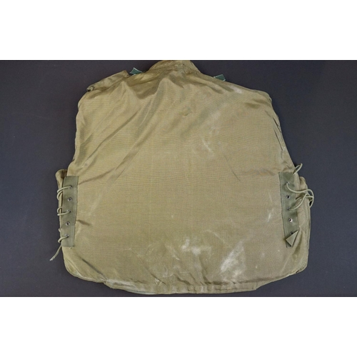 219 - A British military Body armour vest, size XL, dated 1979 (Northern Ireland)