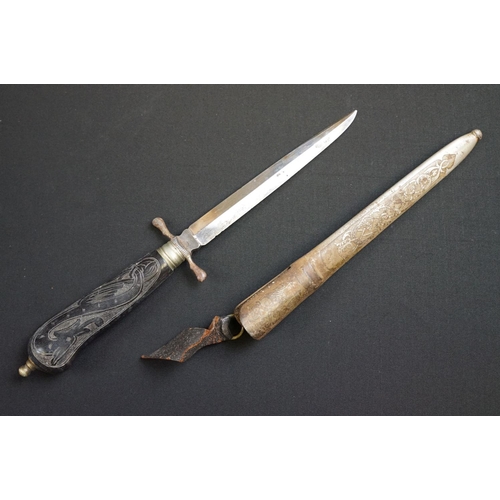 233 - A small group of knives to include a military bayonet, two Arabic daggers and a pair of mounted kukr... 