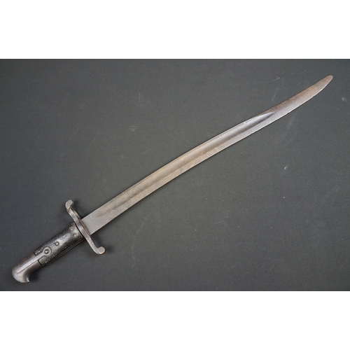 233 - A small group of knives to include a military bayonet, two Arabic daggers and a pair of mounted kukr... 