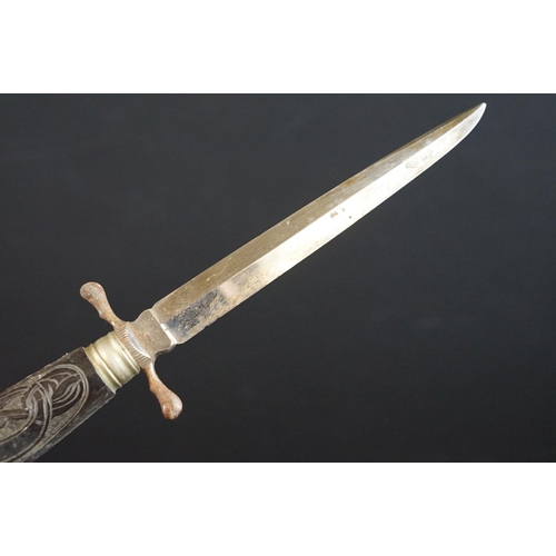 233 - A small group of knives to include a military bayonet, two Arabic daggers and a pair of mounted kukr... 