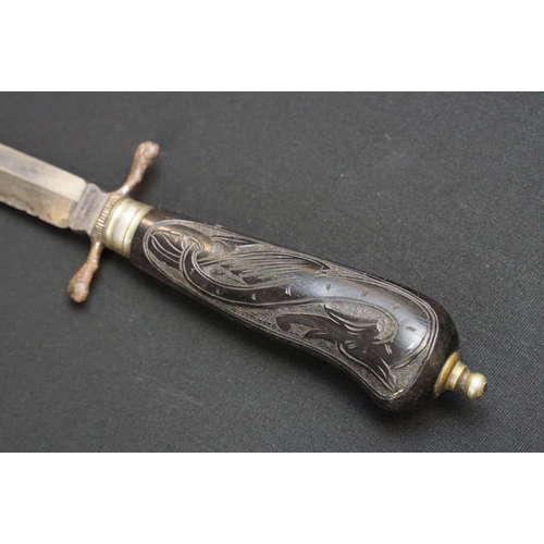 233 - A small group of knives to include a military bayonet, two Arabic daggers and a pair of mounted kukr... 