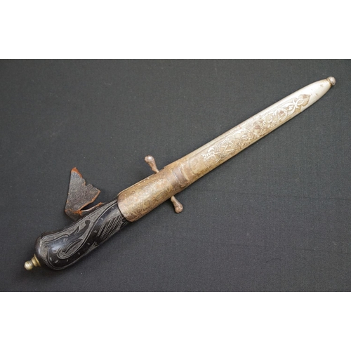 233 - A small group of knives to include a military bayonet, two Arabic daggers and a pair of mounted kukr... 