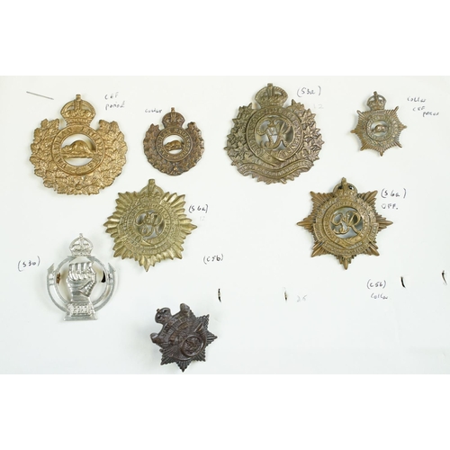 80 - A collection of mainly Canadian military cap and collar badges to include the Royal Engineers, Royal... 