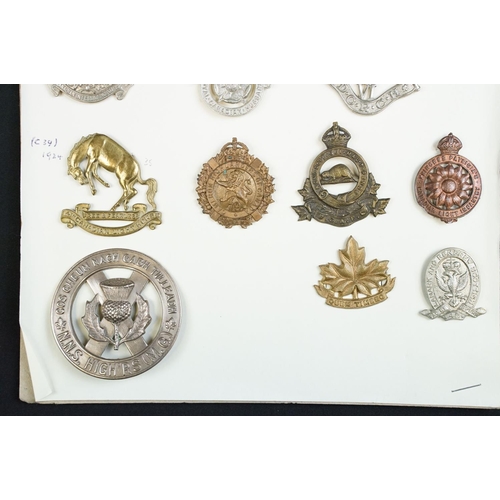 80 - A collection of mainly Canadian military cap and collar badges to include the Royal Engineers, Royal... 