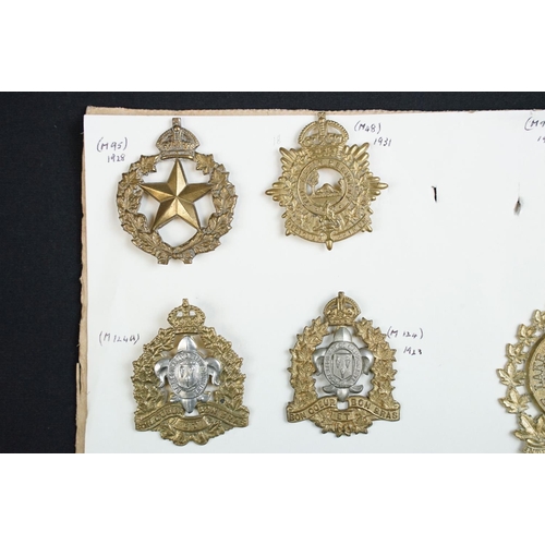 82 - A collection of mainly Canadian military cap badges to include The Lake Superior Regiment, The Halif... 