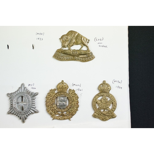 82 - A collection of mainly Canadian military cap badges to include The Lake Superior Regiment, The Halif... 