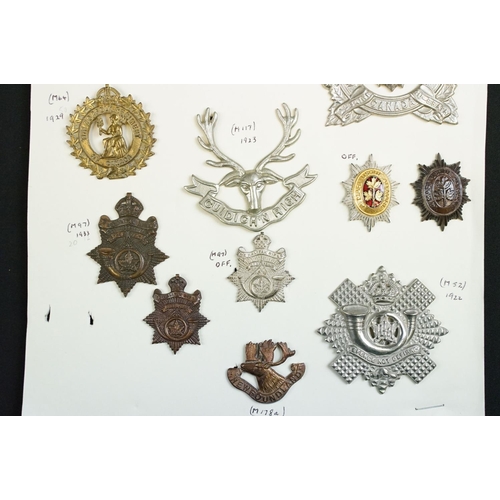 82 - A collection of mainly Canadian military cap badges to include The Lake Superior Regiment, The Halif... 