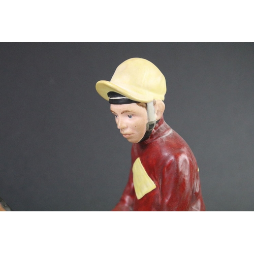 11 - Beswick 'Red Rum' connoisseur model racehorse & jockey, raised on an oblong wooden base, approx 33cm... 