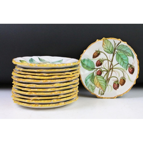 31 - Set of 12 Italian faience plates with hand painted fruit decoration and yellow borders, approx 14cm ... 