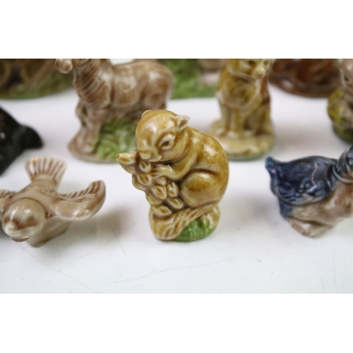 41 - Collection of Wade ceramic animals, mostly Wade Whimsies, also featuring Disney examples