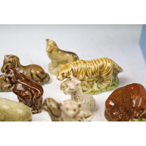 41 - Collection of Wade ceramic animals, mostly Wade Whimsies, also featuring Disney examples