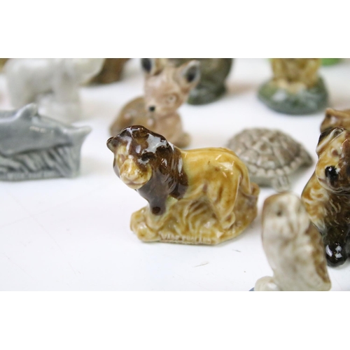 41 - Collection of Wade ceramic animals, mostly Wade Whimsies, also featuring Disney examples