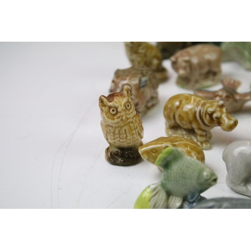 41 - Collection of Wade ceramic animals, mostly Wade Whimsies, also featuring Disney examples