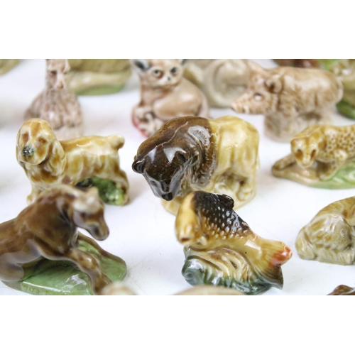 41 - Collection of Wade ceramic animals, mostly Wade Whimsies, also featuring Disney examples