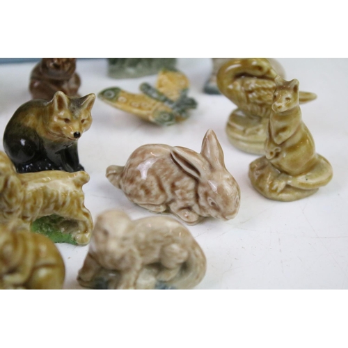 41 - Collection of Wade ceramic animals, mostly Wade Whimsies, also featuring Disney examples