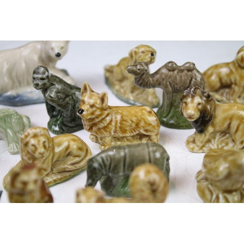 41 - Collection of Wade ceramic animals, mostly Wade Whimsies, also featuring Disney examples