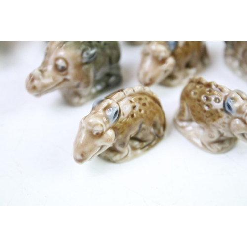 48A - Collection of Wade porcelain miniatures to include Wade Whimsies and Dinosaur examples