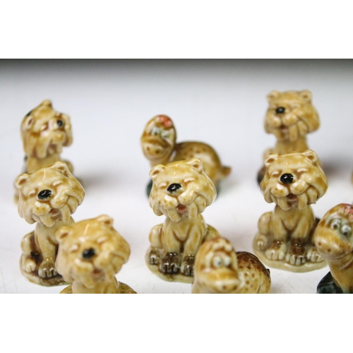 48A - Collection of Wade porcelain miniatures to include Wade Whimsies and Dinosaur examples