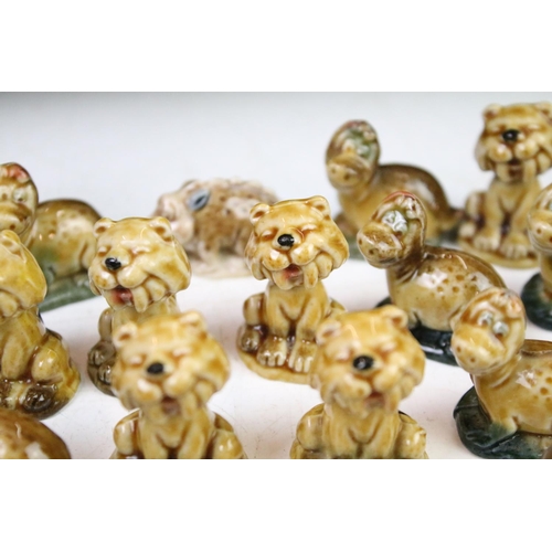 48A - Collection of Wade porcelain miniatures to include Wade Whimsies and Dinosaur examples