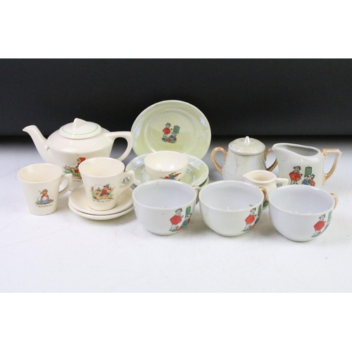 49 - Two vintage porcelain childs tea sets to include a Little Red Riding Hood tea set and a tea set with... 