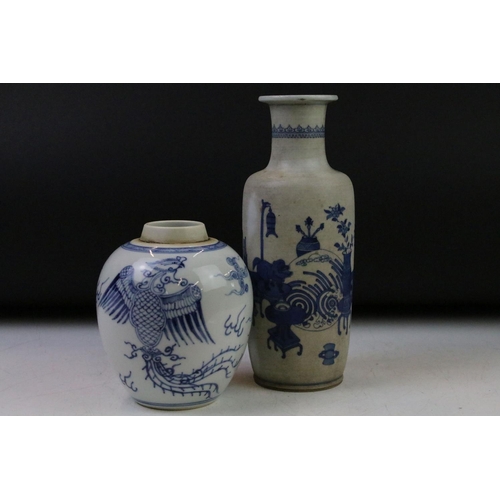 6 - Chinese blue & white baluster vase decorated with a scene with mythical lion, tables & flowers in va... 