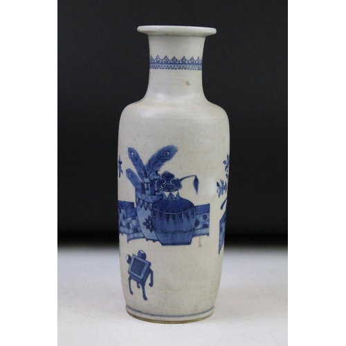 6 - Chinese blue & white baluster vase decorated with a scene with mythical lion, tables & flowers in va... 