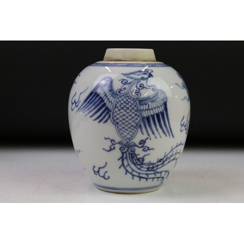 6 - Chinese blue & white baluster vase decorated with a scene with mythical lion, tables & flowers in va... 