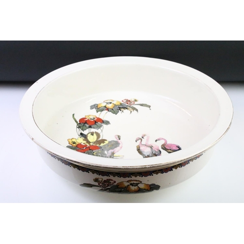 65 - Early 20th Century Falcon Ware ceramic wash basin decorated with flamingos, together with two Victor... 