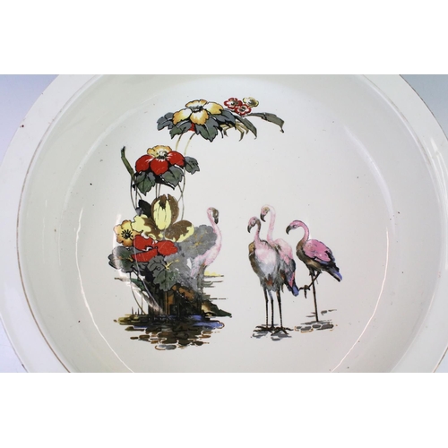 65 - Early 20th Century Falcon Ware ceramic wash basin decorated with flamingos, together with two Victor... 