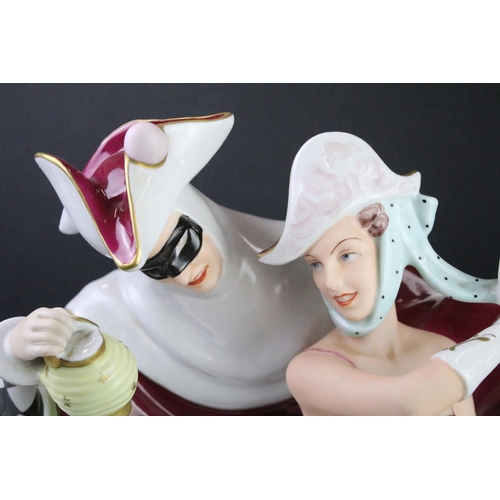 77 - Mid 20th Century Royal Dux carnival figure group depicting a couple dressed for carnival with hand p... 