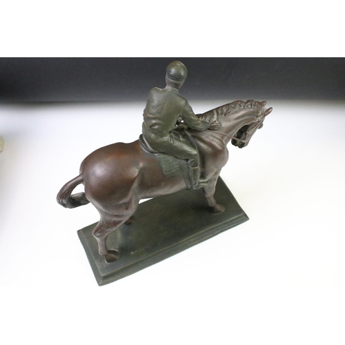 81 - Cast resin horse and jockey figurine marked Cresa 1995, a Beswick lion figurine and a Beswick Burnha... 