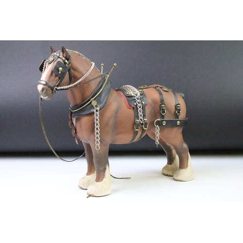 81 - Cast resin horse and jockey figurine marked Cresa 1995, a Beswick lion figurine and a Beswick Burnha... 