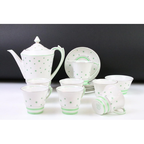 84 - Art Deco Roslyn china coffee set of angular form having a white ground with green star detailing, si... 