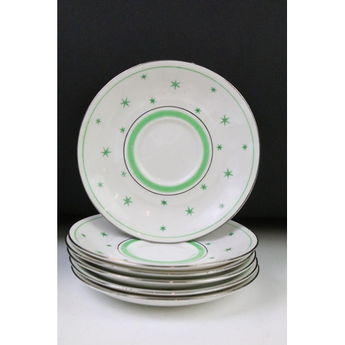 84 - Art Deco Roslyn china coffee set of angular form having a white ground with green star detailing, si... 