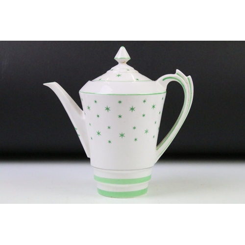 84 - Art Deco Roslyn china coffee set of angular form having a white ground with green star detailing, si... 