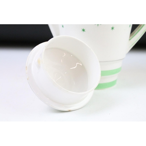 84 - Art Deco Roslyn china coffee set of angular form having a white ground with green star detailing, si... 