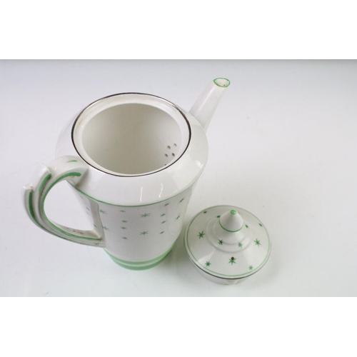 84 - Art Deco Roslyn china coffee set of angular form having a white ground with green star detailing, si... 