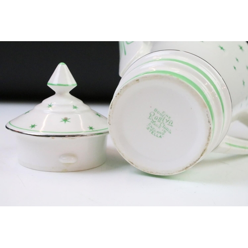 84 - Art Deco Roslyn china coffee set of angular form having a white ground with green star detailing, si... 